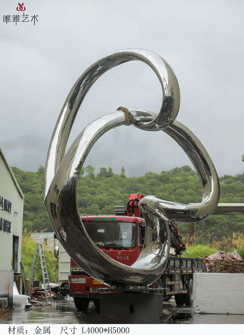 Existing Weiya catalogue photograph of a large reflective looped abstract sculpture with a central opening