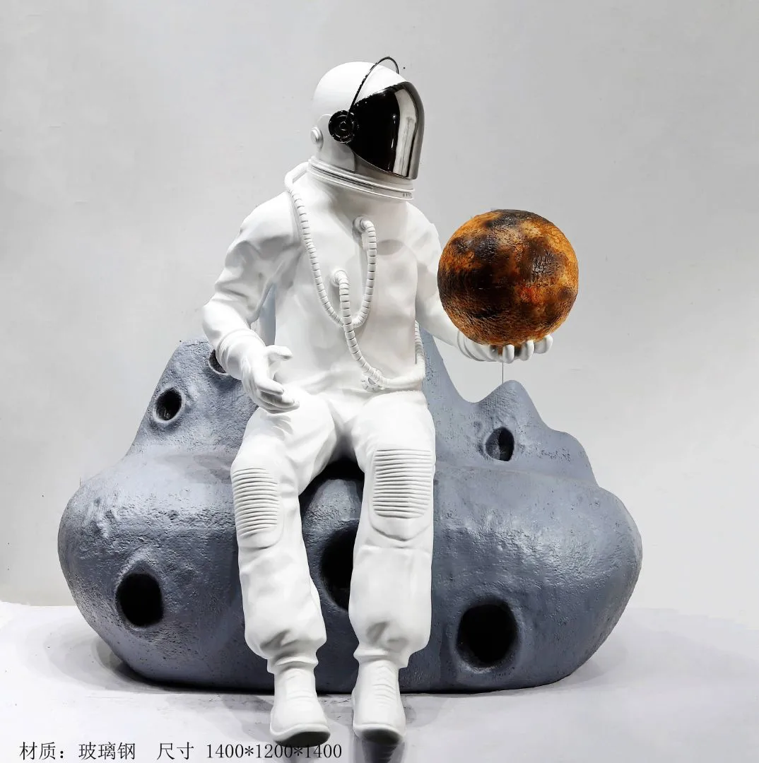 Existing Weiya catalogue photograph of an astronaut-themed decorative sculpture with projecting features